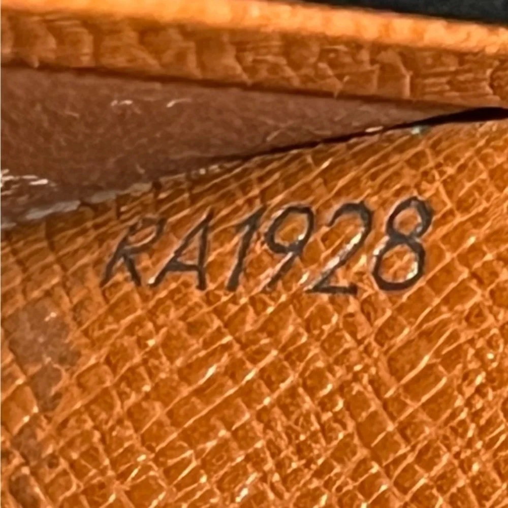 Louis Vuitton Porte Monnaie Wallet in Monogram Canvas
